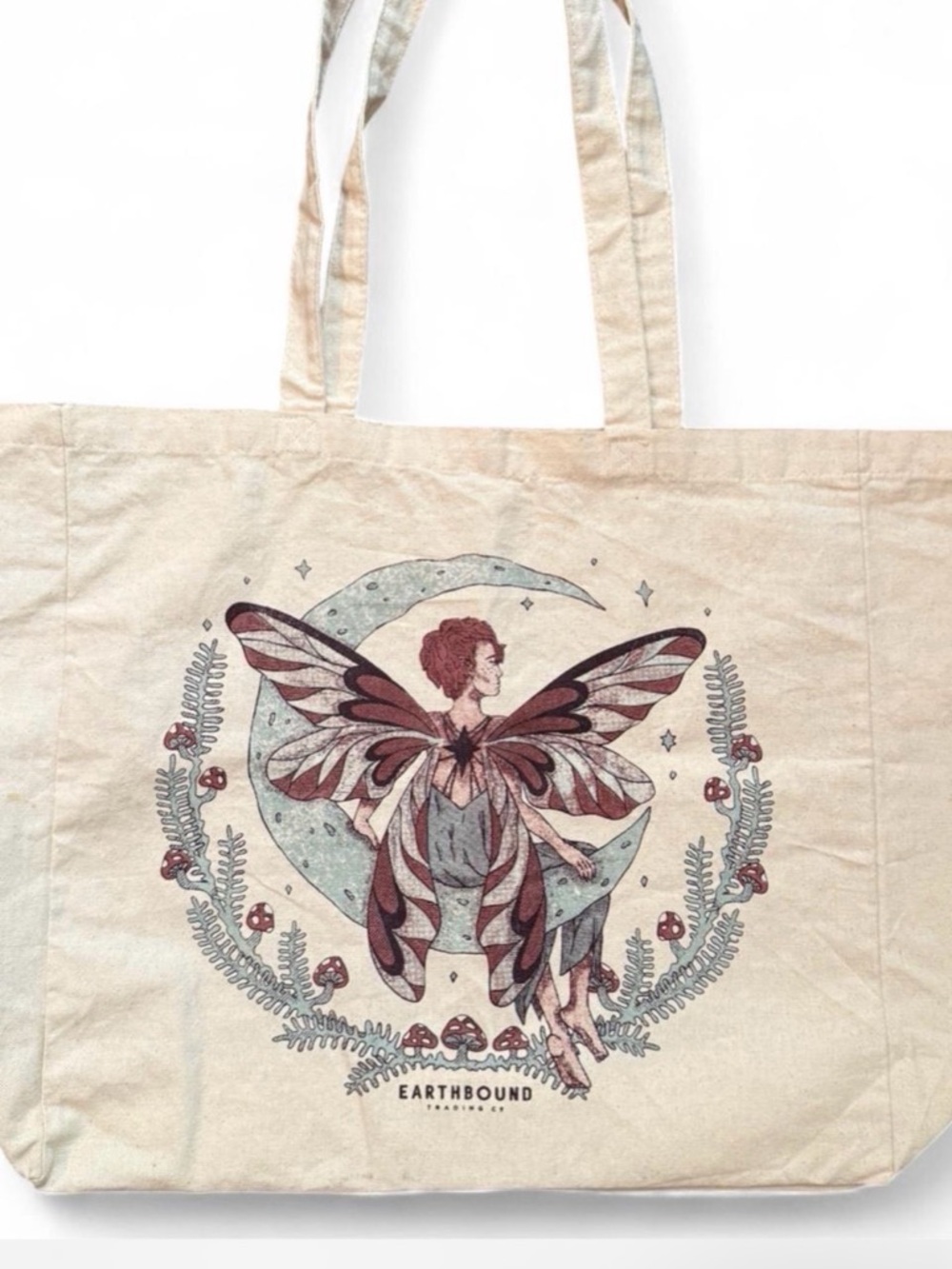 EARTHBOUND Trading Co. cream cotton canvas tote bag. Small spot in very bottom.